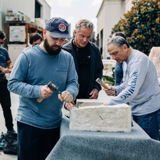 An attendee during the stone carving workshop An attendee during the stone carving workshop