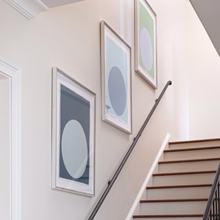 Stephanie Henderson's works on paper look on point climbing this staircase. Designer: Caroline V. Smith Interiors, Photo: Ross Group Creative Stephanie Henderson's works on paper look on point climbing this staircase. Designer: Caroline V. Smith Interiors, Photo: Ross Group Creative