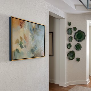 This Elise Morris piece adds a dash of warmth to this cool space. This Elise Morris piece adds a dash of warmth to this cool space.