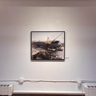 Unveiling a new layer of the exhibition, this image offers a focused view of a singular painting by D'Ospina. The detailed perspective allows for a richer exploration of the artist's technique and the artwork's narrative within Gallery 1261's main space. Unveiling a new layer of the exhibition, this image offers a focused view of a singular painting by D'Ospina. The detailed perspective allows for a richer exploration of the artist's technique and the artwork's narrative within Gallery 1261's main space.