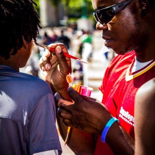 Face painting in Atlanta at Centennial Park for youth event. Face painting in Atlanta at Centennial Park for youth event.