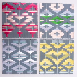 Wall weavings made from wedding ribbons and fabrics. I stashed all the ribbons from a couple's wedding reception (ex: place setting napkin ribbons, program ties, baskets trimmed with ribbons and tulle) and other decor. I used four 12x12 stretcher bars to make this set of Cherokee basketry pattern weavings out of them all. I used a heart pattern and the Chief’s Daughter pattern. This could be done with ribbons from any occasion, ceremony, or gift-giving gathering (which often have ribbons on the wrapping or product packaging!)
