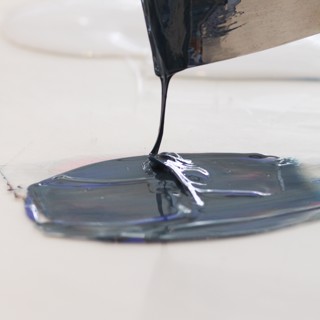 Laura mixing ink for a layer of the lithograph print. Photography by Laura Berman. Laura mixing ink for a layer of the lithograph print. Photography by Laura Berman.