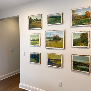 Private residence in the Berkshires with grid installation of plein air landscapes by Harry Orlyk