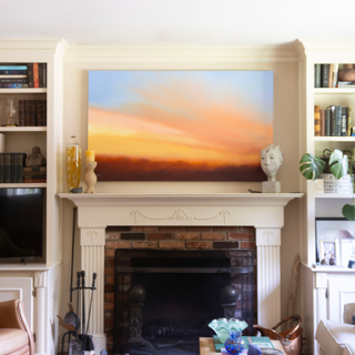 Pam Hassler's painting anchors the room with warmth and serenity, perfectly complementing the cozy textures and natural tones throughout this space. Photo: Alice Crenshaw Pam Hassler's painting anchors the room with warmth and serenity, perfectly complementing the cozy textures and natural tones throughout this space. Photo: Alice Crenshaw