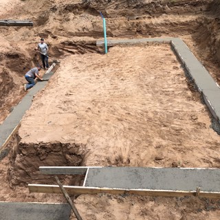 Pouring the footing Pouring the footing