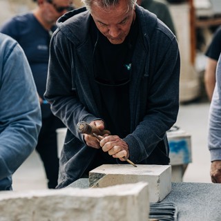 An attendee during the stone carving workshop An attendee during the stone carving workshop