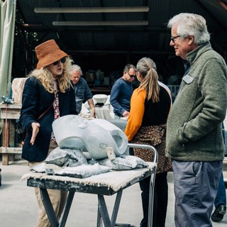 Sonya and Winston looking at work by sculptor Jay Honig Sonya and Winston looking at work by sculptor Jay Honig