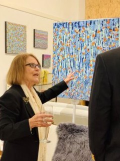 Ann Parks McCray interacting with a client in New Elements Gallery. Ann Parks McCray interacting with a client in New Elements Gallery.