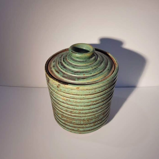 Richard Winslow | Matte Green Ribbed Vessel with Cover | Ceramic | 9" X 6.5" | $110