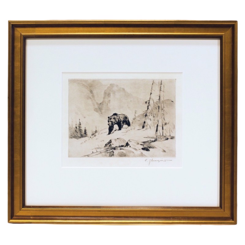 Etching of a bear in a gold frame
